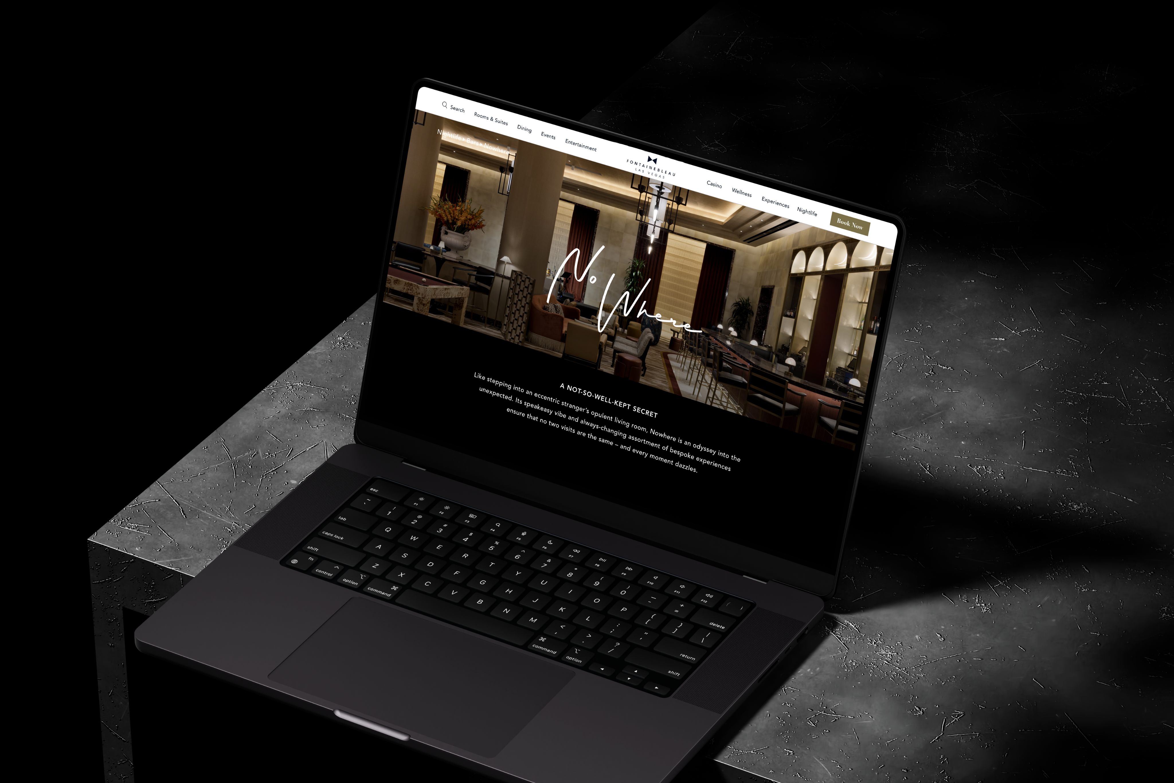 Website design showcase on a laptop.